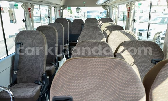 Buy Import Toyota Coaster White Car in Import - Dubai in Uganda Buy Import Toyota Coaster White Car in Import - Dubai in Uganda