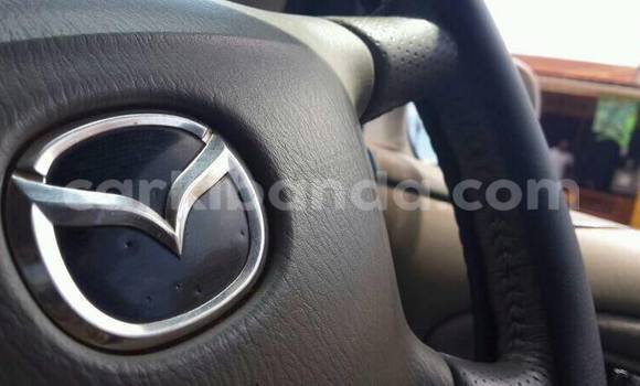 Gura Yakoze Mazda Premacy Black Imodoka i Kampala mu Uganda Gura Yakoze Mazda Premacy Black Imodoka i Kampala mu Uganda