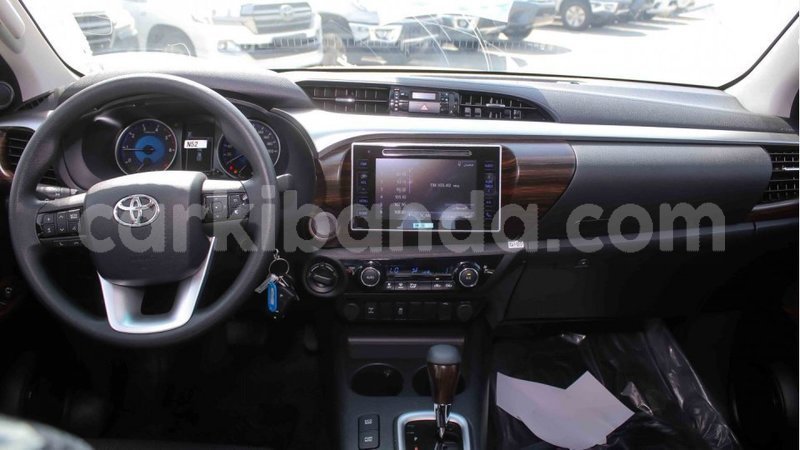 Big with watermark toyota hilux uganda import dubai 9899