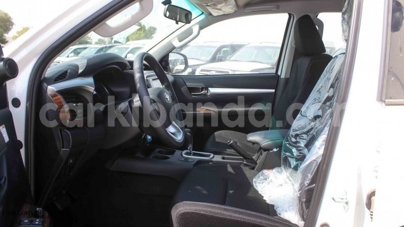 Big with watermark toyota hilux uganda import dubai 9899