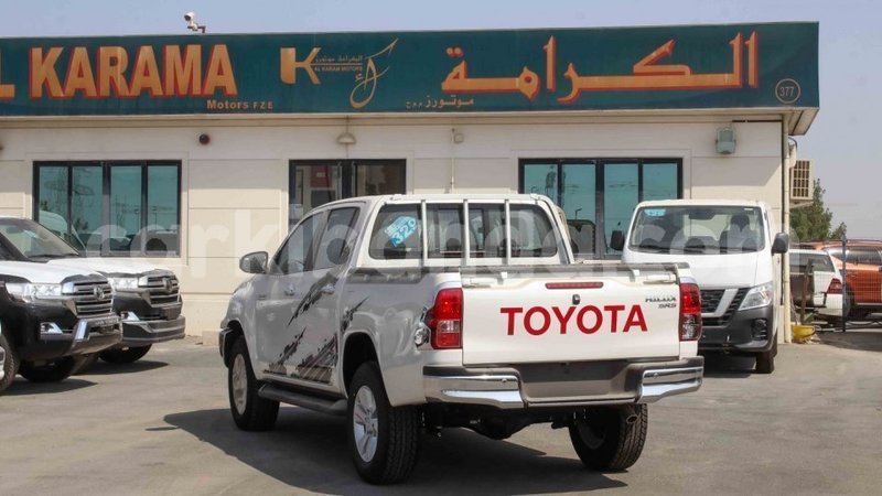 Big with watermark toyota hilux uganda import dubai 9899