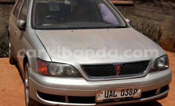 Gura Yakoze Toyota Vista Silver Imodoka i Kampala mu Uganda Gura Yakoze Toyota Vista Silver Imodoka i Kampala mu Uganda