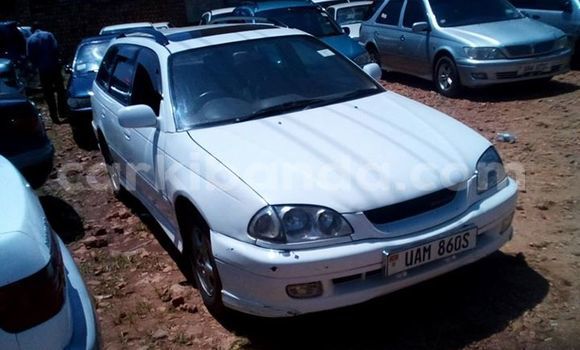Gura Yakoze Toyota Caldina White Imodoka i Kampala mu Uganda Gura Yakoze Toyota Caldina White Imodoka i Kampala mu Uganda