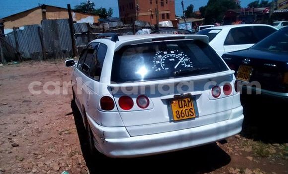 Gura Yakoze Toyota Caldina White Imodoka i Kampala mu Uganda Gura Yakoze Toyota Caldina White Imodoka i Kampala mu Uganda