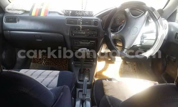 Gura Yakoze Toyota Corsa Silver Imodoka i Kampala mu Uganda Gura Yakoze Toyota Corsa Silver Imodoka i Kampala mu Uganda