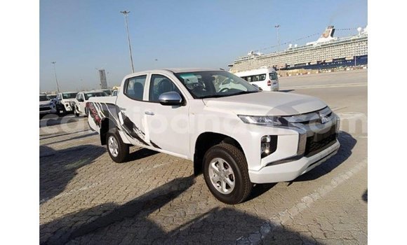 Gura Imported Mitsubishi L200 White Imodoka i Import - Dubai mu Uganda Gura Imported Mitsubishi L200 White Imodoka i Import - Dubai mu Uganda