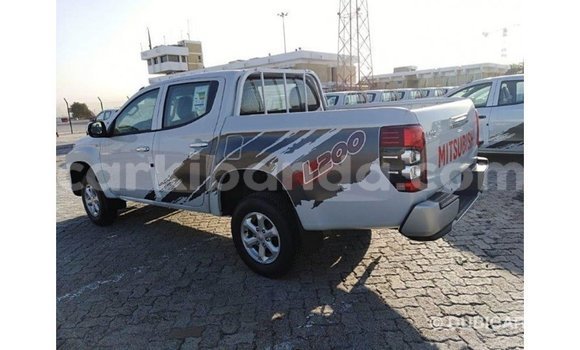 Gura Imported Mitsubishi L200 White Imodoka i Import - Dubai mu Uganda Gura Imported Mitsubishi L200 White Imodoka i Import - Dubai mu Uganda