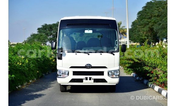 Buy Import Toyota Coaster White Car in Import - Dubai in Uganda Buy Import Toyota Coaster White Car in Import - Dubai in Uganda