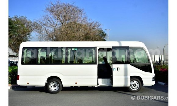 Acheter Import Voiture Toyota Coaster Blanc à Import - Dubai, Ouganda Acheter Import Voiture Toyota Coaster Blanc à Import - Dubai, Ouganda