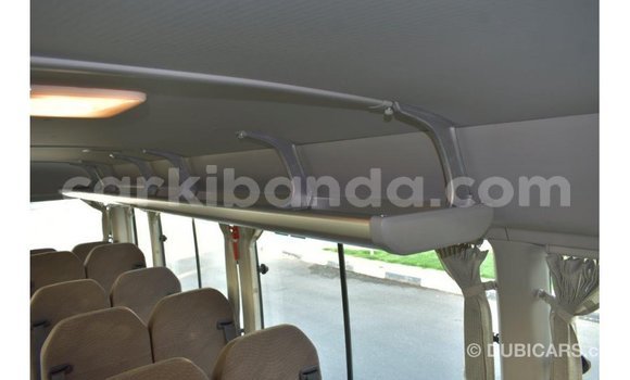 Acheter Import Voiture Toyota Coaster Blanc à Import - Dubai, Ouganda Acheter Import Voiture Toyota Coaster Blanc à Import - Dubai, Ouganda