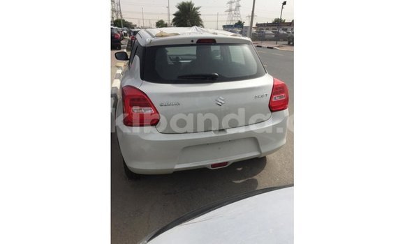 Buy Import Suzuki Swift White Car in Import - Dubai in Uganda Buy Import Suzuki Swift White Car in Import - Dubai in Uganda