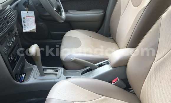 Gura Yakoze Toyota Corolla Silver Imodoka i Kampala mu Uganda Gura Yakoze Toyota Corolla Silver Imodoka i Kampala mu Uganda