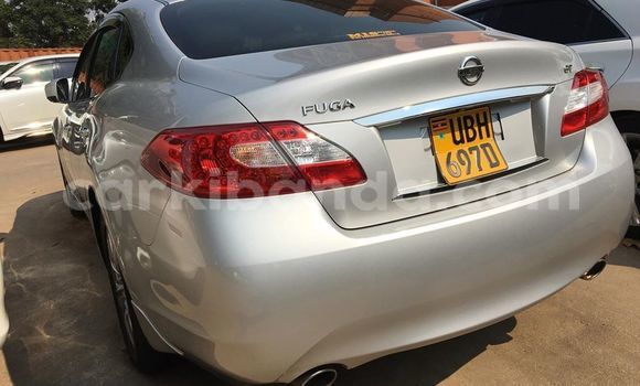 Gura Yakoze Nissan Fuga Silver Imodoka i Kampala mu Uganda Gura Yakoze Nissan Fuga Silver Imodoka i Kampala mu Uganda
