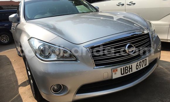 Gura Yakoze Nissan Fuga Silver Imodoka i Kampala mu Uganda Gura Yakoze Nissan Fuga Silver Imodoka i Kampala mu Uganda