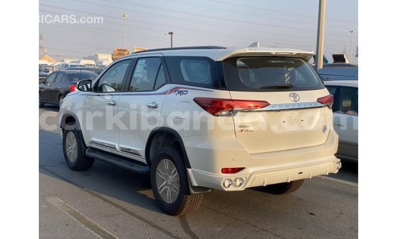 Gura Imported Toyota Fortuner White Imodoka i Import - Dubai mu Uganda Gura Imported Toyota Fortuner White Imodoka i Import - Dubai mu Uganda